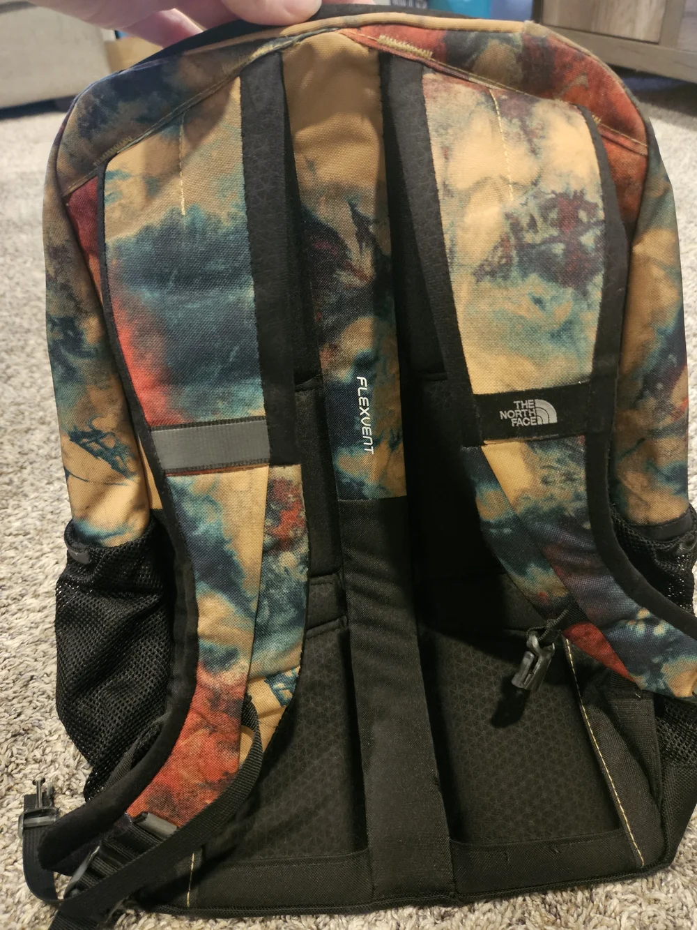 The North Face Multicolor Tie-Dye Backpack with Black Accents and Mustard Panel
